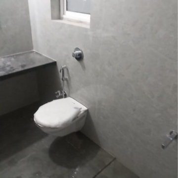 Attached Bathroom in 1 BHK Apartment at Drushti Group Embassy, Naidu Colony – for Rent