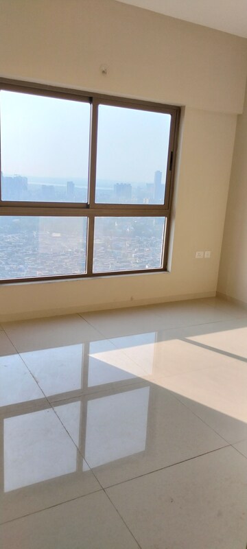 Bedroom in 2 BHK Apartment at Shapoorji Pallonji Astron, Kandivali East – for Rent