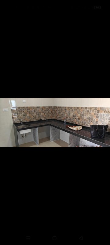 Kitchen in 3 BHK Apartment at Raj Infinia, Mira Road – for Rent