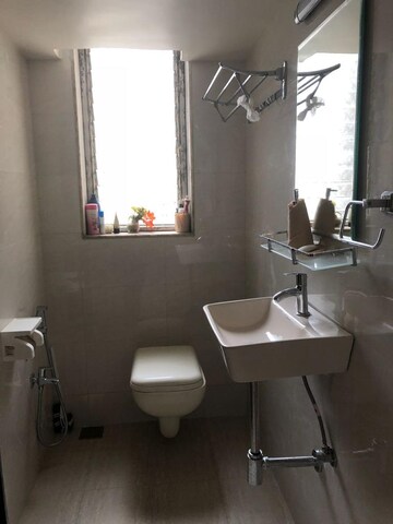 Bathroom in 2 BHK Apartment at Dhoop Chaon Society, Andheri West – for Sale