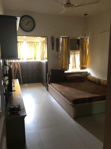 Living Room in 2 BHK Apartment at Dhoop Chaon Society, Andheri West – for Sale