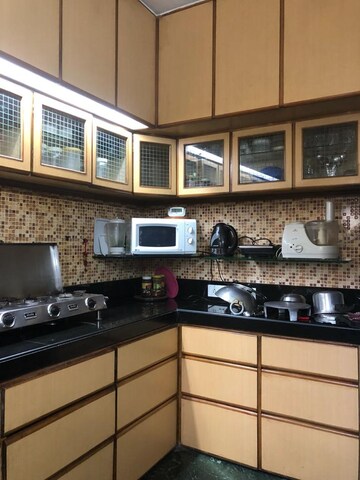 Kitchen in 2 BHK Apartment at Dhoop Chaon Society, Andheri West – for Sale