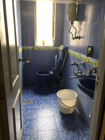 Bathroom in 2 BHK Apartment at Dhoop Chaon Society, Andheri West – for Sale