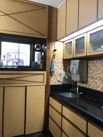 Kitchen in 2 BHK Apartment at Dhoop Chaon Society, Andheri West – for Sale