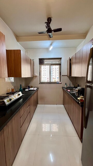 Kitchen in 3 BHK Apartment at Lodha Splendora, Ghodbunder Road – for Sale