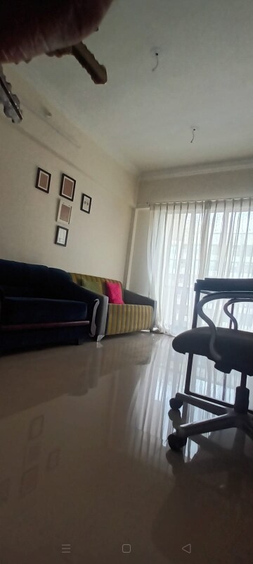Living Room in 1 BHK Apartment at Ekta Brooklyn Park, Virar West – for Sale