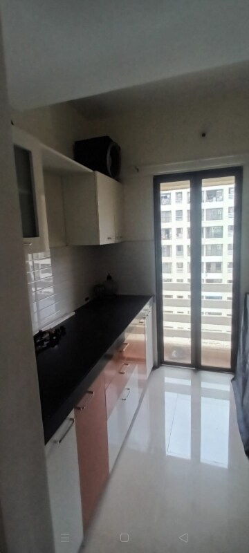 Kitchen in 1 BHK Apartment at Ekta Brooklyn Park, Virar West – for Sale