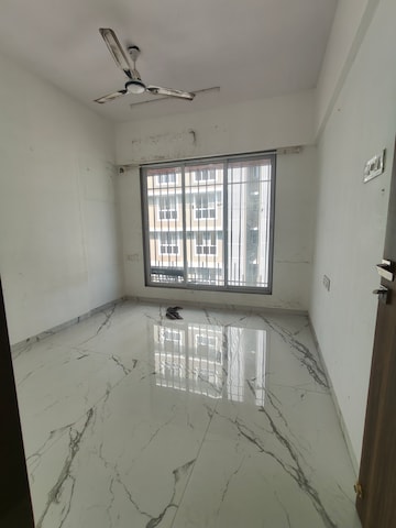 Room in 1 BHK Apartment at Romell Serene, Borivali West – for Rent