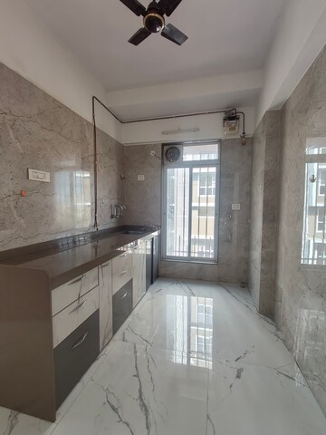 Kitchen in 1 BHK Apartment at Romell Serene, Borivali West – for Rent