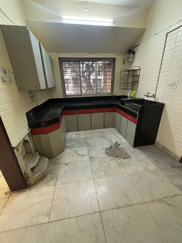 Kitchen in 1 BHK Apartment at Satyam CHS Naupada, Naupada – for Rent