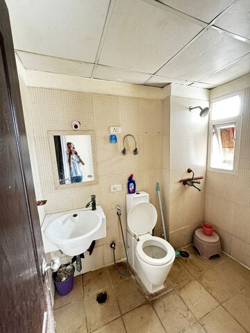 Bathroom in 2 BHK Apartment at Aditya Celebrity Homes, Sector 76 – for Rent