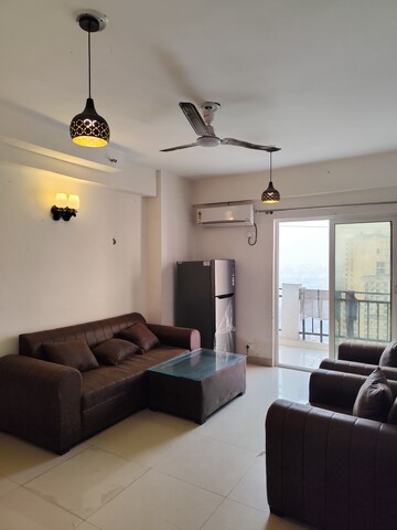 Living Room in 2 BHK Apartment at Aims Golf City, Sector 75 – for Rent
