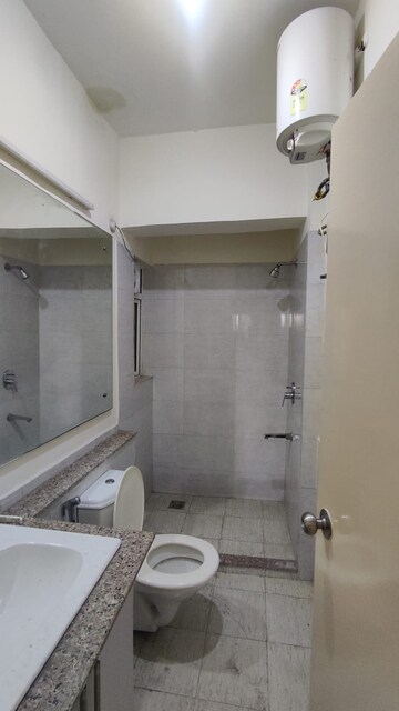 Bathroom in 3 BHK Apartment at Moti Nagar – for Rent