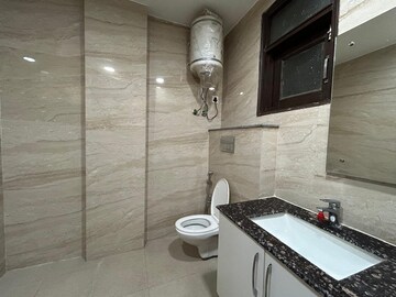 Bathroom in 3 BHK Builder Floor at Freedom Fighters Enclave – for Rent