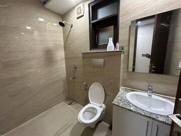 Bathroom in 3 BHK Builder Floor at Freedom Fighters Enclave – for Rent