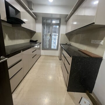 Kitchen in 3 BHK Apartment at Oberoi Sky City, Khande Rao Dongari – for Rent