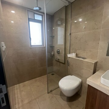 Bathroom in 3 BHK Apartment at Oberoi Sky City, Khande Rao Dongari – for Rent
