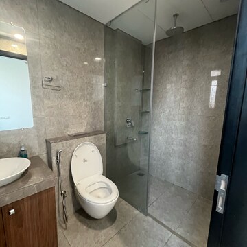 Bathroom in 3 BHK Apartment at Oberoi Sky City, Khande Rao Dongari – for Rent