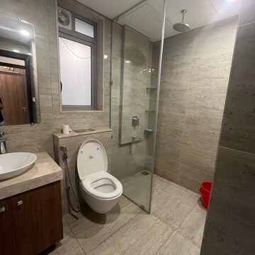 Bathroom in 3 BHK Apartment at Oberoi Sky City, Khande Rao Dongari – for Rent