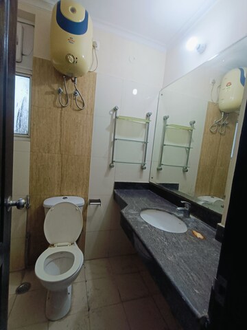 Bathroom in 3 BHK Builder Floor at Ansal API Esencia, Sector 67 – for Rent