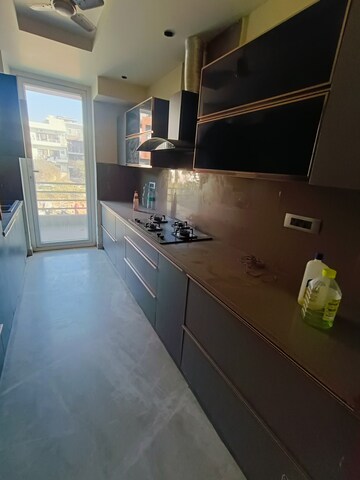 Kitchen in 4 BHK Builder Floor at Ansal API Esencia, Sector 67 – for Rent