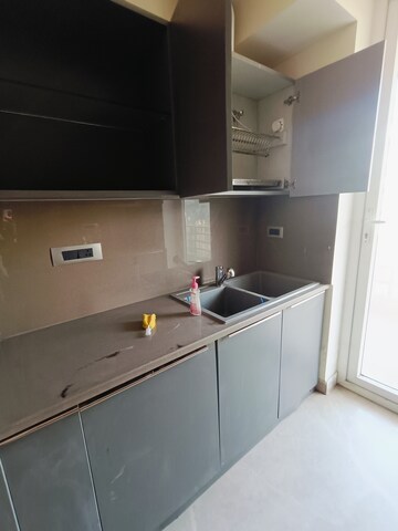 Kitchen in 4 BHK Builder Floor at Ansal API Esencia, Sector 67 – for Rent