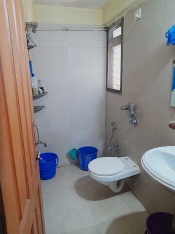 Bathroom in 2 BHK Apartment at Iris CHS, Kasarvadavali – for Sale
