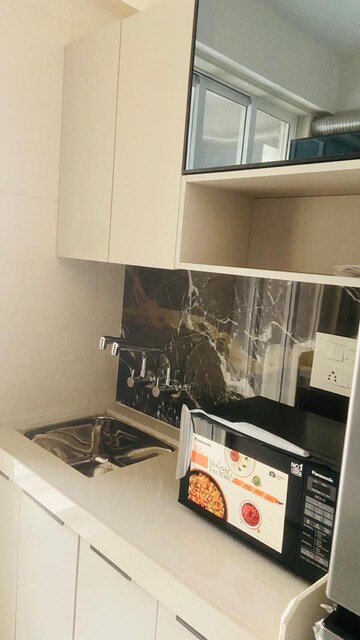 Kitchen in 1 BHK Apartment at Unique Ivana, Ketkipada – for Rent
