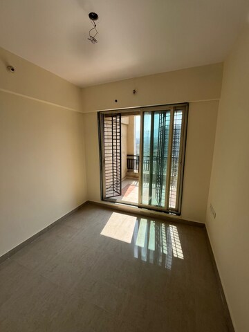 Room in 1 BHK Apartment at Mohan Willows, Badlapur East – for Rent