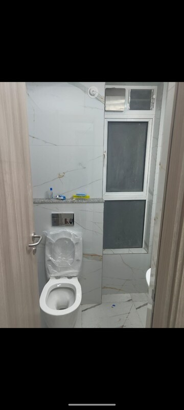Bathroom in 2 BHK Apartment at Shapoorji Pallonji Alpine, Kandivali East – for Rent