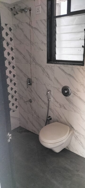 Bathroom in 2 BHK Apartment at Godrej Nest Kandivali, Kandivali East – for Rent