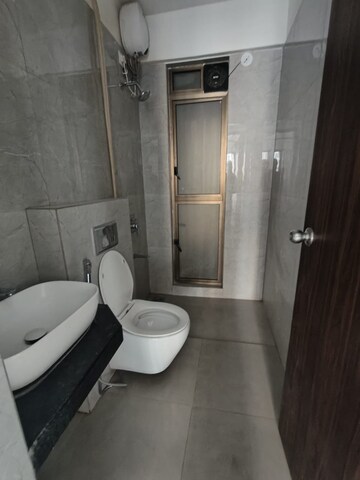 Bathroom in 2 BHK Apartment at Raymond Ten X Habitat, Pokhran Road No 2 – for Rent