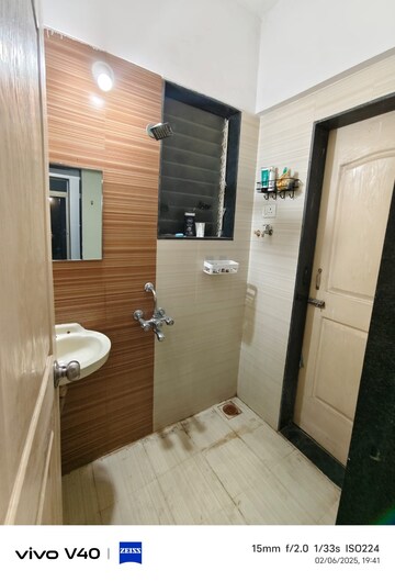 Bathroom in 1 BHK Apartment at Innovative R K Residency, Nerul – for Rent