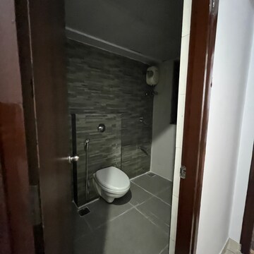 Bathroom in 1.5 BHK Apartment at Lodha Palava City, Katai Village – for Rent