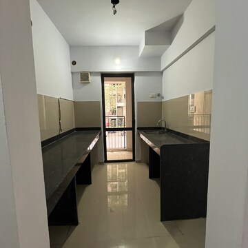 Kitchen in 1.5 BHK Apartment at Lodha Palava City, Katai Village – for Rent