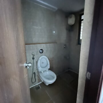 Bathroom in 1.5 BHK Apartment at Lodha Palava City, Katai Village – for Rent