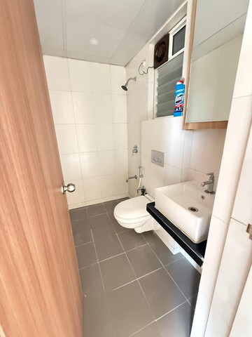 Bathroom in 1.5 BHK Apartment at Godrej Emerald, Ghodbunder Road – for Rent