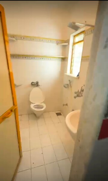 Bathroom in 2 BHK Apartment at Maheshwar Kunj CHS, Santacruz West – for Rent