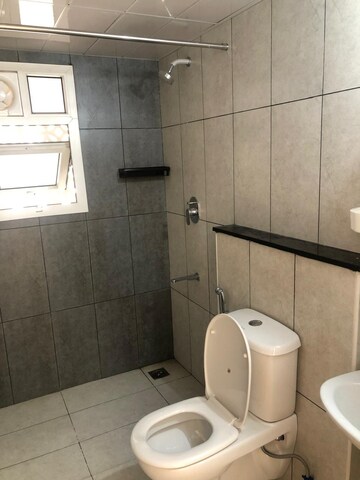 Bathroom in 2 BHK Apartment at Prestige Song Of The South, Yelenahalli – for Rent