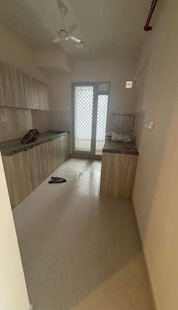 Kitchen in 2 BHK Apartment at Piramal Vaikunth Vama, Balkum Pada – for Rent