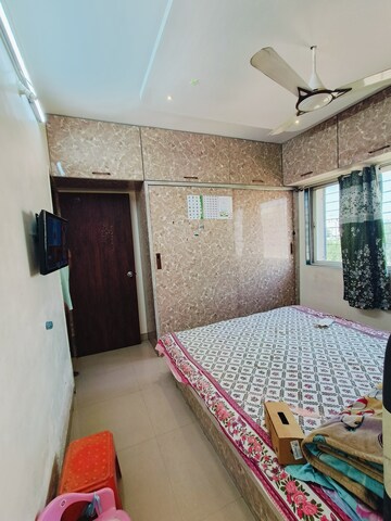 Bedroom in 1 BHK Apartment at Wadgaon Sheri – for Sale