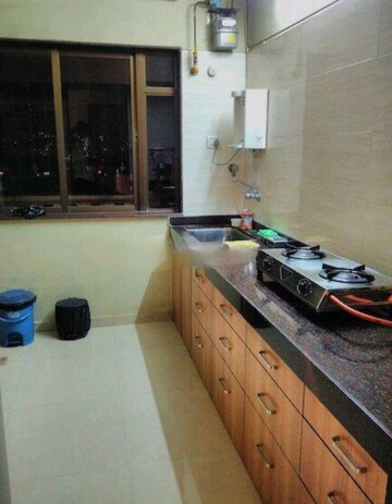 Kitchen in 2 BHK Apartment at Hyde Park Galaxy, Manpada – for Rent