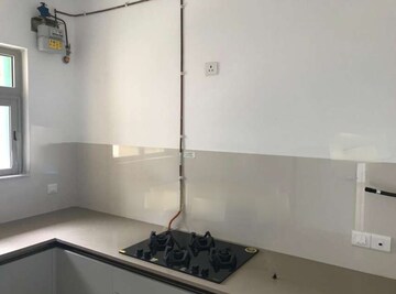 Kitchen in 3 BHK Apartment at Hiranandani Skylark Enclave, Ghodbunder Road – for Rent