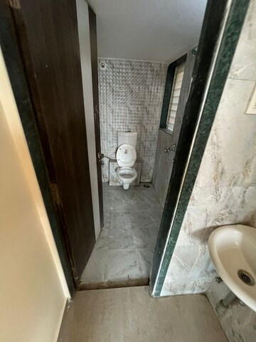 Building Lobby in 1 BHK Apartment at Mohan Willows, Badlapur East – for Sale