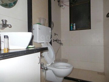 Bathroom in 1 BHK Apartment at Deokidham CHS, Goregaon East – for Rent