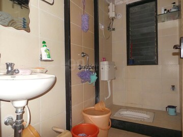 Bathroom in 1 BHK Apartment at Deokidham CHS, Goregaon East – for Rent