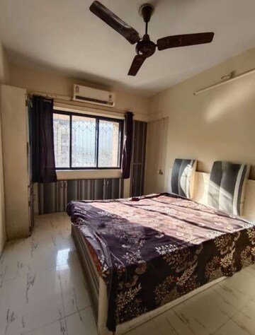 Bedroom in 2 BHK Apartment at Cosmos Heritage, Manpada – for Rent