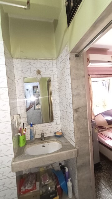 Bathroom in 1 BHK Apartment at Amod CHS, Goregaon East – for Rent