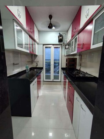 Kitchen in 2 BHK Apartment at Rustomjee Urbania, Majiwada – for Rent