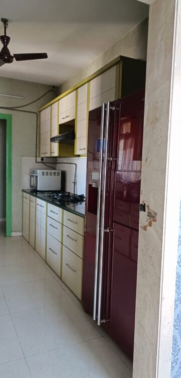 Kitchen in 3 BHK Apartment at Hiranandani Meadows, Manpada – for Rent
